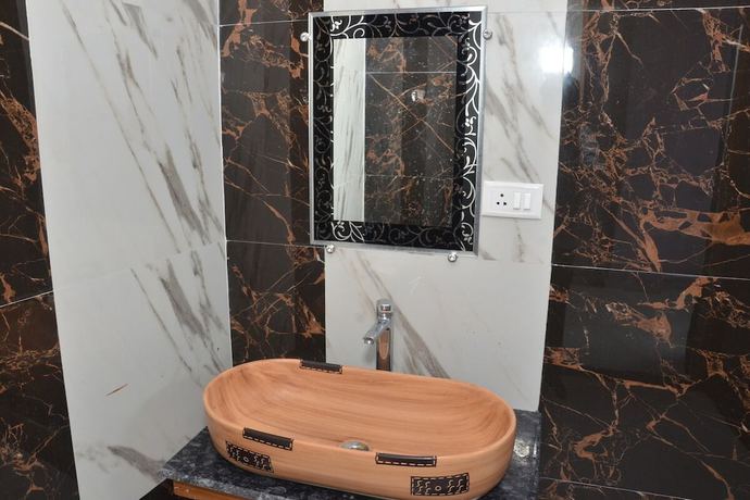 Imagen de la habitación del Hotel Blue Bell Rishikesh. Foto 10