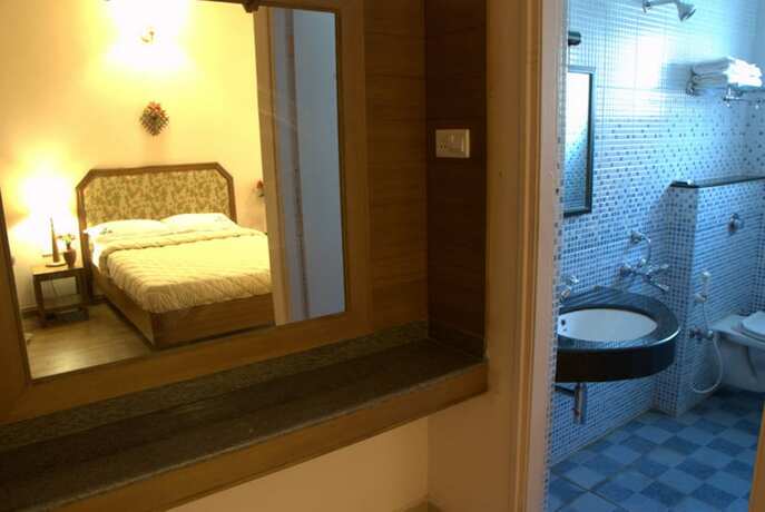 Imagen de la habitación del Hotel Blue Bird, Udhagamandalam. Foto 17