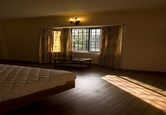 Imagen de la habitación del Hotel Blue Bird, Udhagamandalam. Foto 20