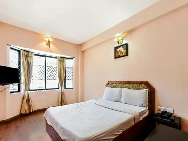 Imagen de la habitación del Hotel Blue Bird, Udhagamandalam. Foto 21