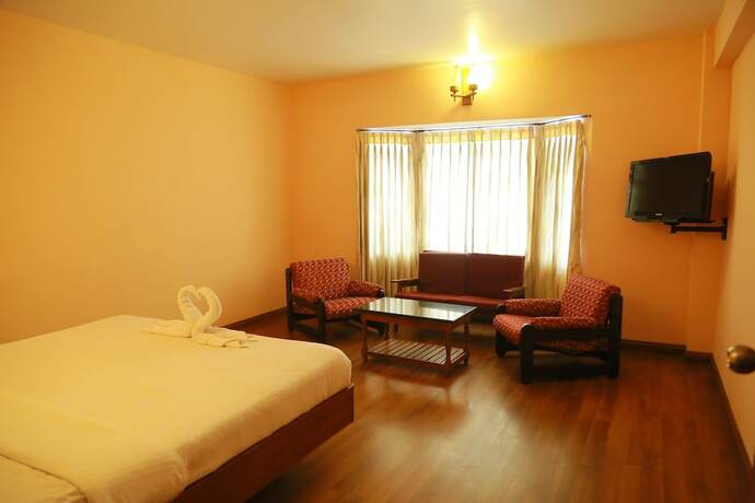 Imagen de la habitación del Hotel Blue Bird, Udhagamandalam. Foto 23