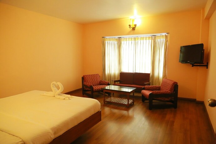 Imagen de la habitación del Hotel Blue Bird, Udhagamandalam. Foto 30