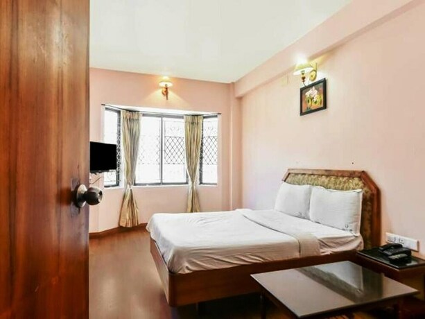 Imagen de la habitación del Hotel Blue Bird, Udhagamandalam. Foto 33