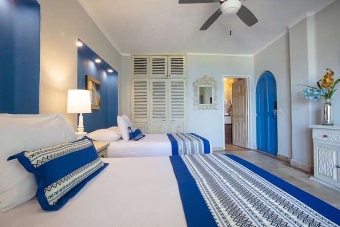 Imagen de la habitación del Hotel Blue Chairs Beachfront Resort Puerto Vallarta - Adults Only. Foto 10