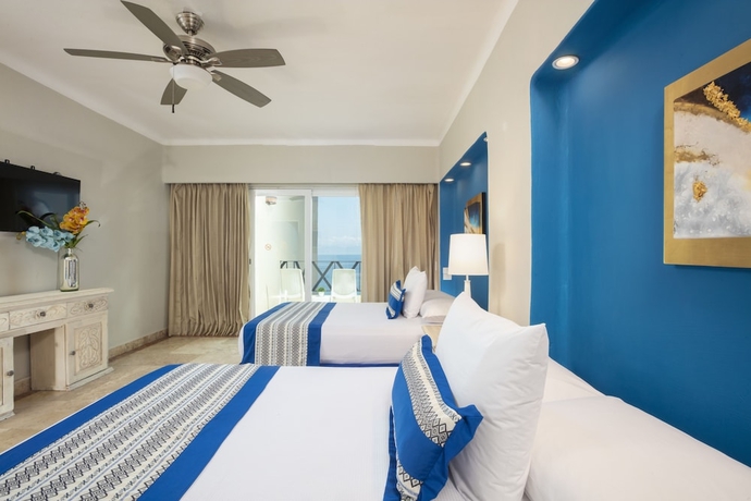 Imagen de la habitación del Hotel Blue Chairs Beachfront Resort Puerto Vallarta - Adults Only. Foto 11
