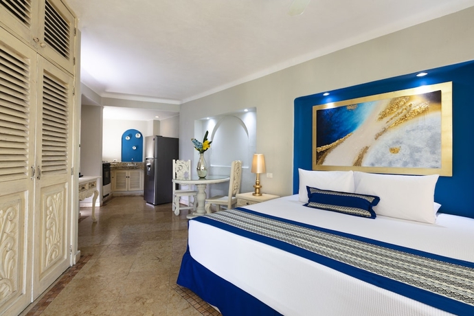 Imagen de la habitación del Hotel Blue Chairs Beachfront Resort Puerto Vallarta - Adults Only. Foto 14