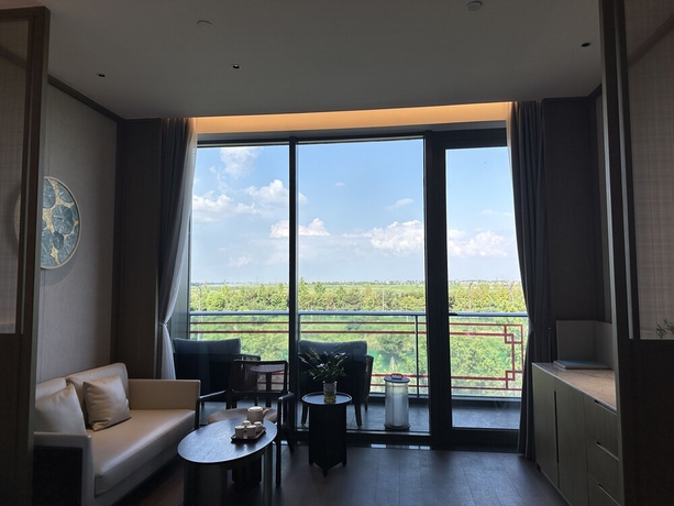 Imagen de la habitación del Hotel Blue City Fenghe Resort. Foto 4