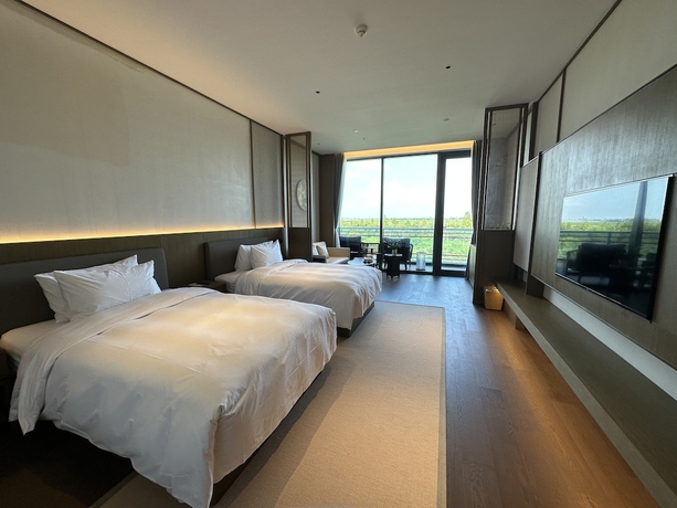 Imagen de la habitación del Hotel Blue City Fenghe Resort. Foto 5