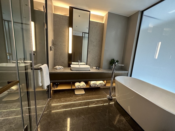 Imagen de la habitación del Hotel Blue City Fenghe Resort. Foto 10