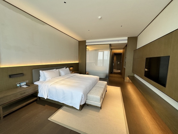 Imagen de la habitación del Hotel Blue City Fenghe Resort. Foto 11