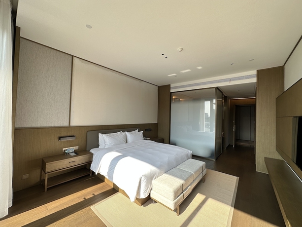 Imagen de la habitación del Hotel Blue City Fenghe Resort. Foto 16