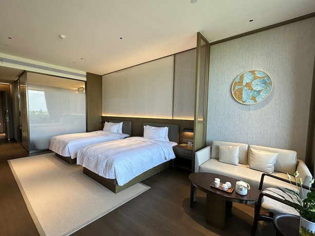 Imagen de la habitación del Hotel Blue City Fenghe Resort. Foto 17