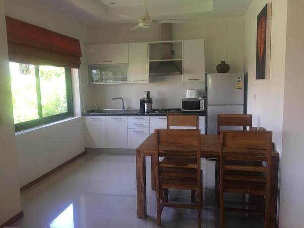 Imagen de la habitación del Hotel Blue Coconut Residence. Foto 16