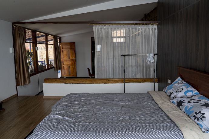 Imagen de la habitación del Hotel Blue Door Housing Historic Quito. Foto 2