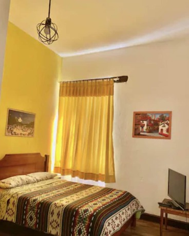 Imagen de la habitación del Hotel Blue Door Housing Historic Quito. Foto 4