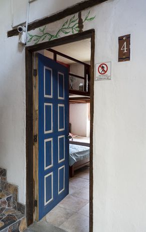 Imagen de la habitación del Hotel Blue Door Housing Historic Quito. Foto 6