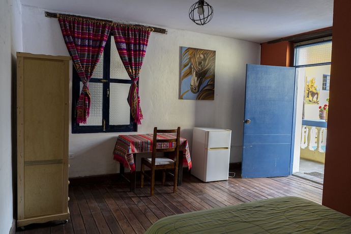 Imagen de la habitación del Hotel Blue Door Housing Historic Quito. Foto 8