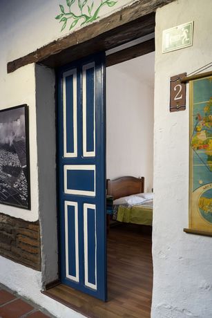 Imagen de la habitación del Hotel Blue Door Housing Historic Quito. Foto 10