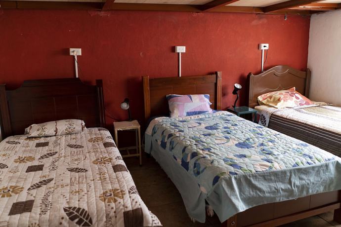 Imagen de la habitación del Hotel Blue Door Housing Historic Quito. Foto 12