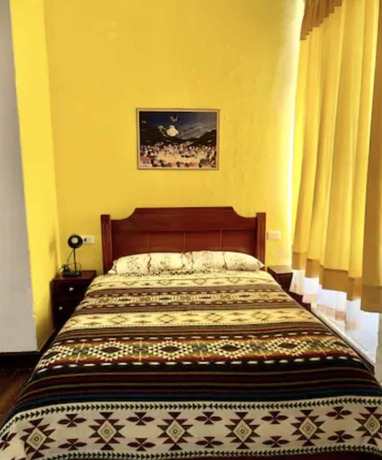 Imagen de la habitación del Hotel Blue Door Housing Historic Quito. Foto 17
