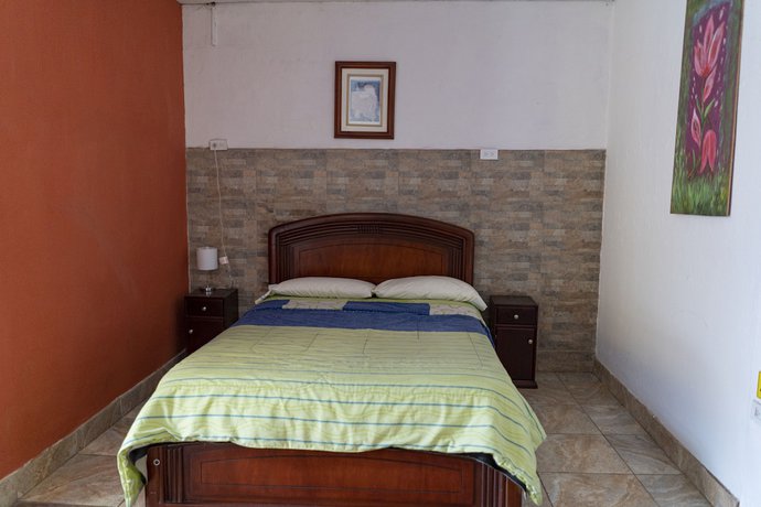 Imagen de la habitación del Hotel Blue Door Housing Historic Quito. Foto 18