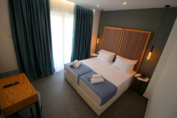 Imagen de la habitación del Hotel Blue Eye. Foto 14