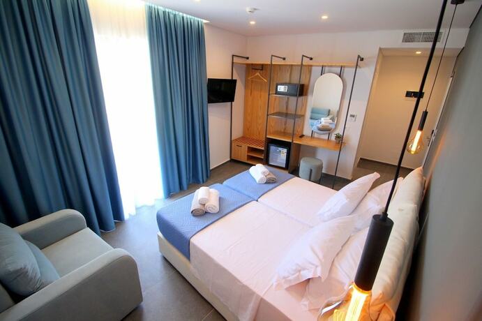 Imagen de la habitación del Hotel Blue Eye. Foto 18