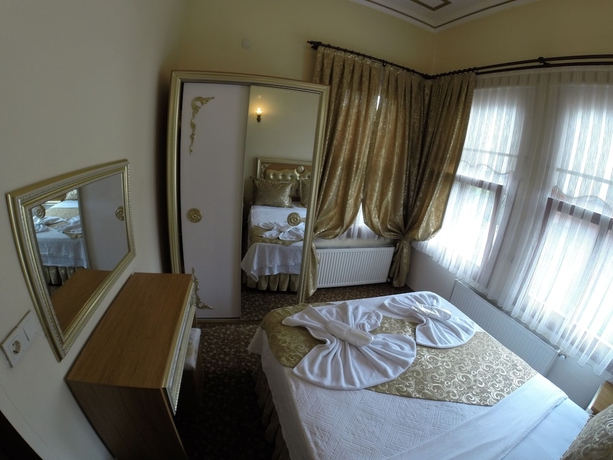 Imagen de la habitación del Hotel Blue Eye Suites. Foto 2