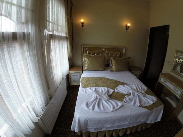 Imagen de la habitación del Hotel Blue Eye Suites. Foto 3