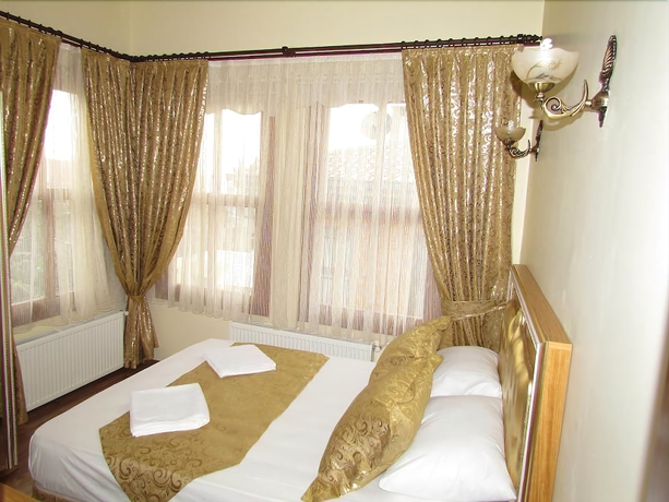 Imagen de la habitación del Hotel Blue Eye Suites. Foto 8