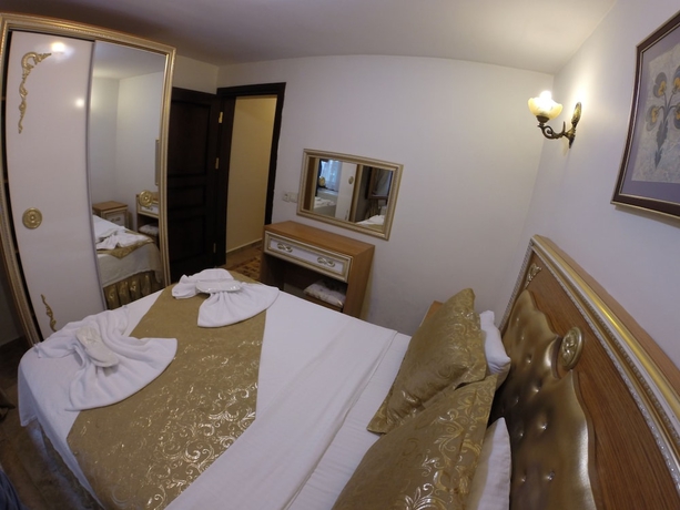 Imagen de la habitación del Hotel Blue Eye Suites. Foto 12