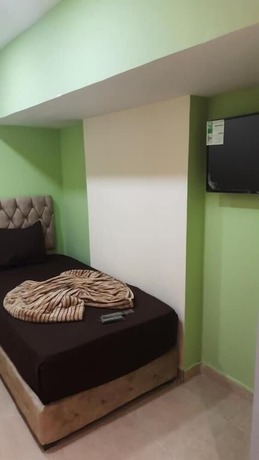 Imagen de la habitación del Hotel Blue Eyes. Foto 6