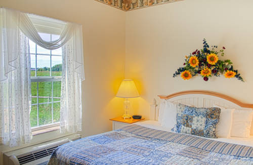 Imagen de la habitación del Hotel Blue Gate Garden Inn. Foto 13