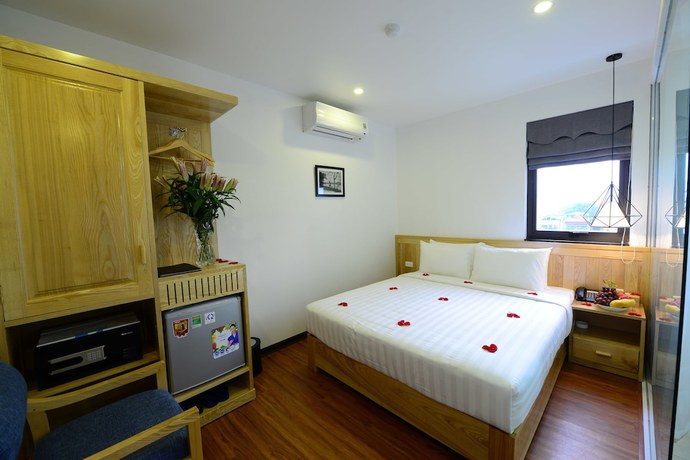 Imagen de la habitación del Hotel Blue Hanoi Inn Luxury. Foto 7