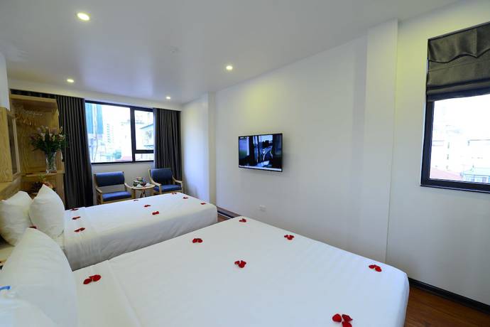 Imagen de la habitación del Hotel Blue Hanoi Inn Luxury. Foto 9