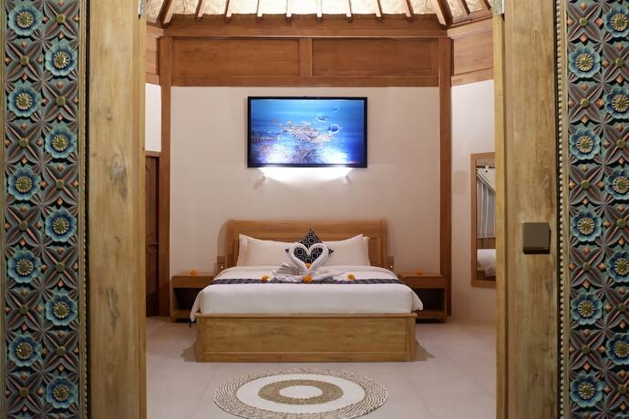 Imagen de la habitación del Hotel Blue Harbor Beachfront Villas and Resto. Foto 14