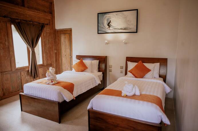 Imagen de la habitación del Hotel Blue Harbor Beachfront Villas and Resto. Foto 15