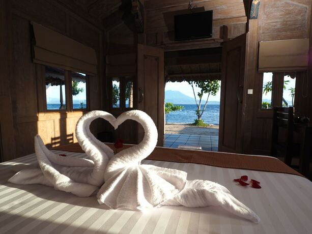 Imagen de la habitación del Hotel Blue Harbor Beachfront Villas and Resto. Foto 16