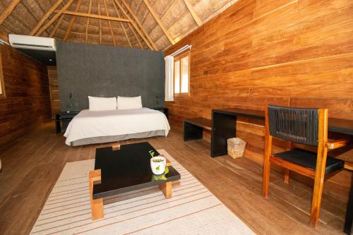 Imagen de la habitación del Hotel Blue Holbox. Foto 20
