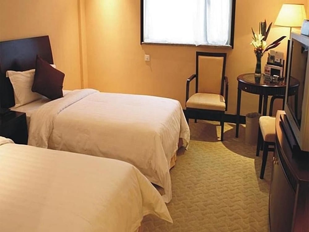 Imagen de la habitación del Hotel Blue Horizon International. Foto 2