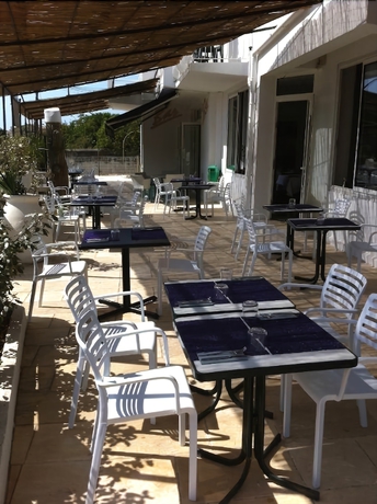 Imagen del bar/restaurante del Hotel Blue Hotel. Foto 6