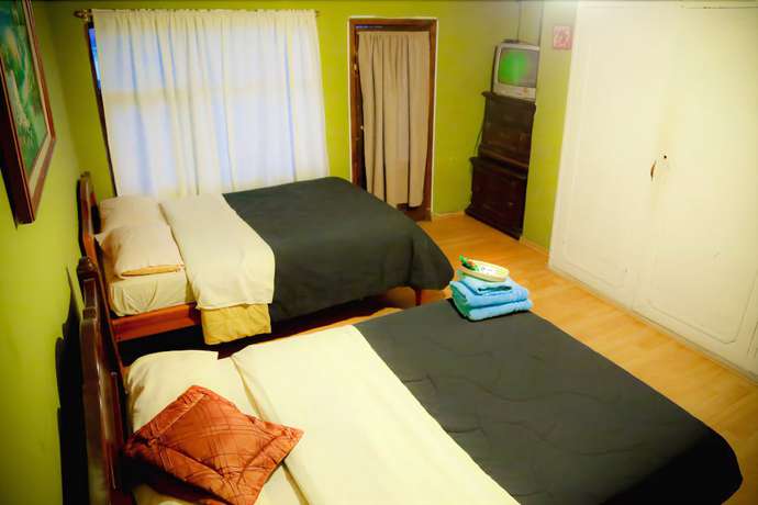 Imagen de la habitación del Hotel Blue House Youth Hostel. Foto 6