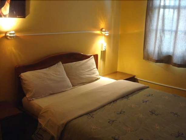 Imagen de la habitación del Hotel Blue House Youth Hostel. Foto 8