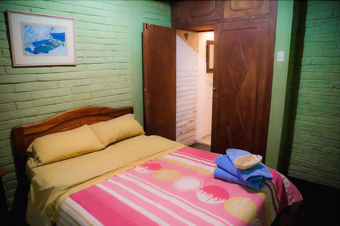 Imagen de la habitación del Hotel Blue House Youth Hostel. Foto 10