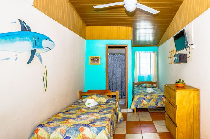 Imagen de la habitación del Hotel Blue Iguana. Foto 5