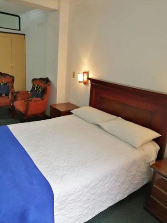 Imagen de la habitación del Hotel Blue Inn, Quito. Foto 7