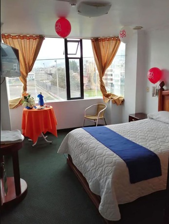 Imagen de la habitación del Hotel Blue Inn, Quito. Foto 9