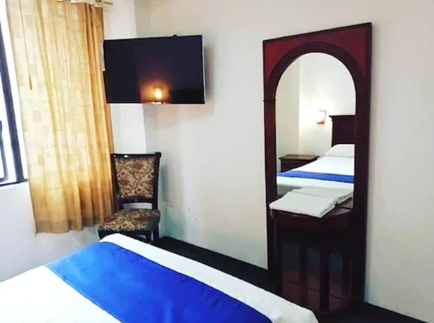 Imagen de la habitación del Hotel Blue Inn, Quito. Foto 10