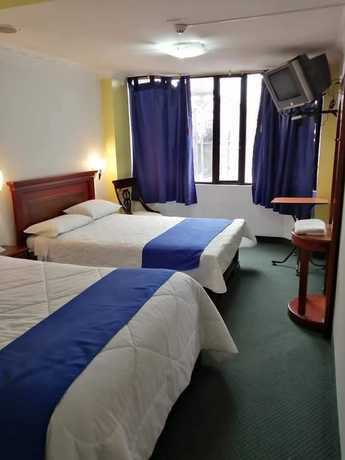 Imagen de la habitación del Hotel Blue Inn, Quito. Foto 11