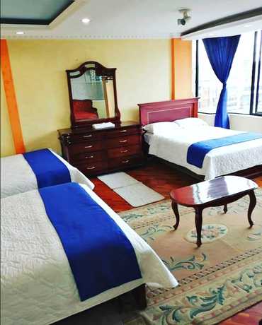 Imagen de la habitación del Hotel Blue Inn, Quito. Foto 12